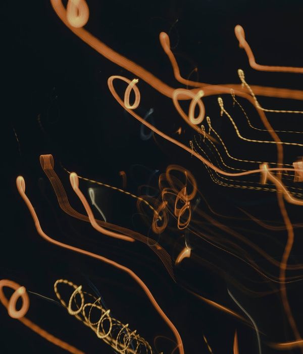 Abstract glowing lines representing gentle physical movement practice